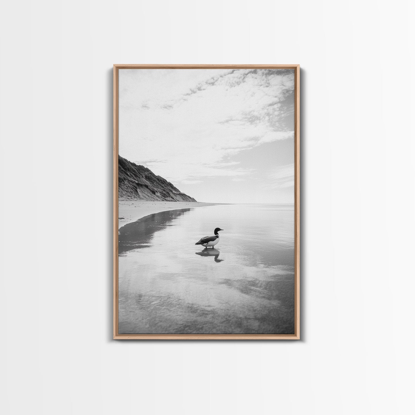 Lone Loon, Quiet Reflection, Coastal Bird, Framed Canvas Print, Nature Wall Art, Bathroom Decor, Serene Black and White Art